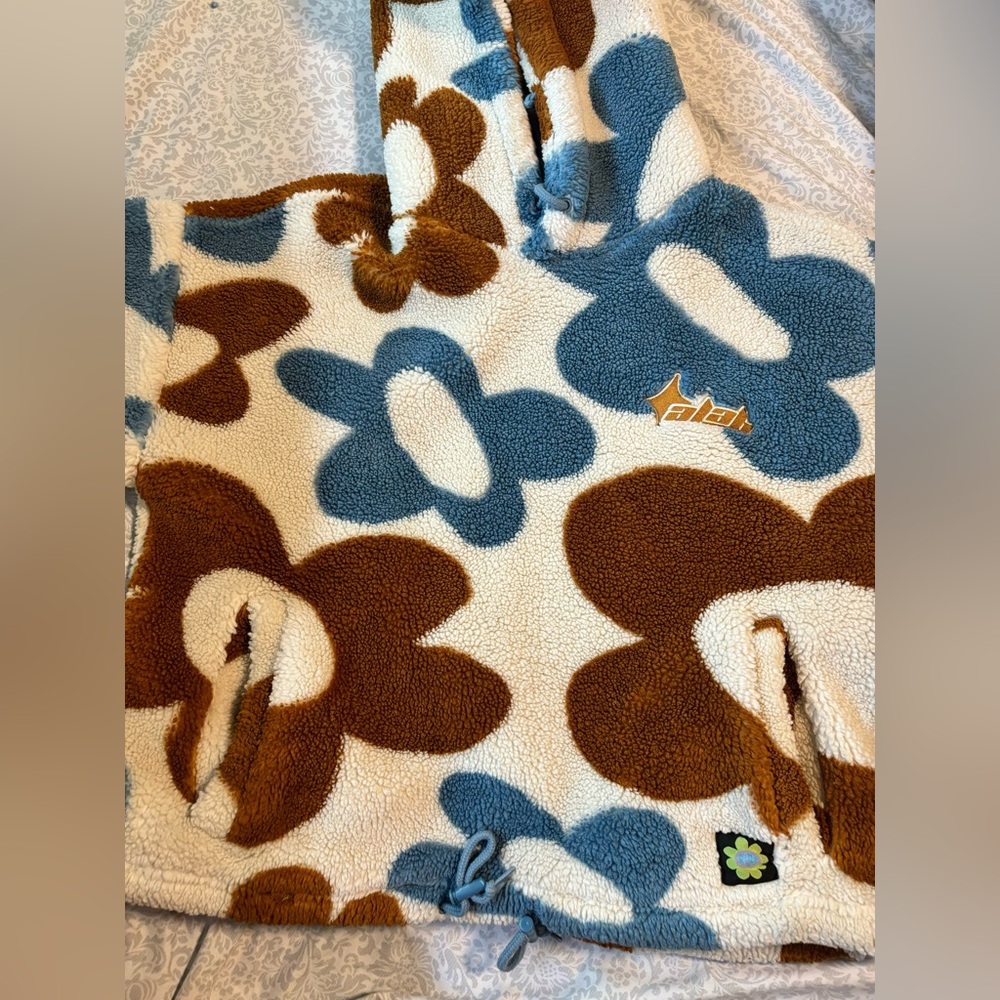Furry jacket with brown and blue flower print